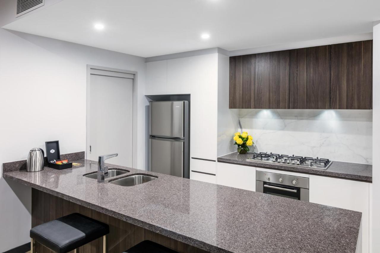 Meriton Suites Chatswood Sydney Exterior photo A typical kitchen in a modern apartment